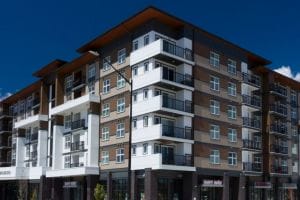 The Bravado (Ironclad Bridgewater LP) -149-unit mixed-use development in Winnipeg, MB with ground floor commercial units containing retail, service, and medical uses.