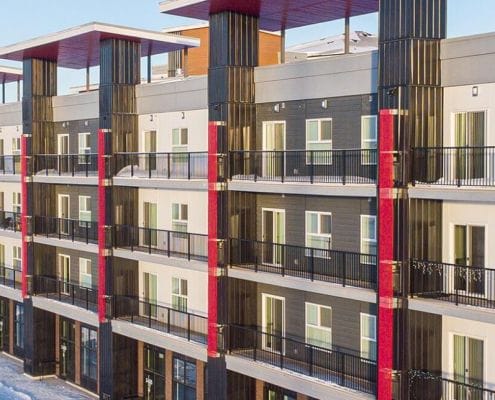 The Crossings (Ironclad BG LP) - 147-unit residential apartment building in Winnipeg, MB with extensive tenant amenity spaces including a golf simulator and bowling alley. The Crossings (Ironclad BG LP) - 147-unit residential apartment building in Winnipeg, MB with extensive tenant amenity spaces including a golf simulator and bowling alley.